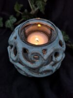 Serenity Glow: The Elegant Round Candle Holder - Greyish blue matte color